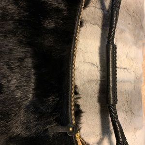 Black rabbit fur hobby bag. Never Used . Beautiful.
